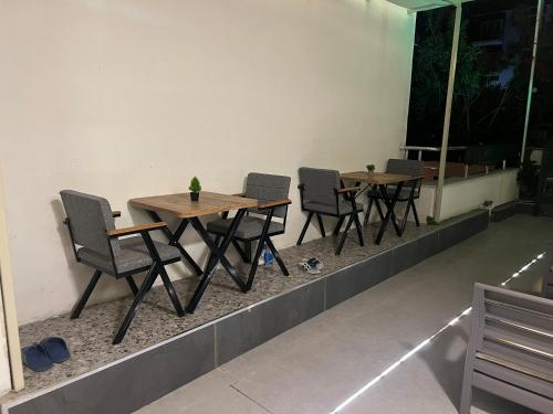 a row of tables and chairs in a room at Ada Park Hotel in Kusadası