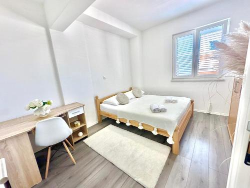Postel nebo postele na pokoji v ubytování Apartman Niko