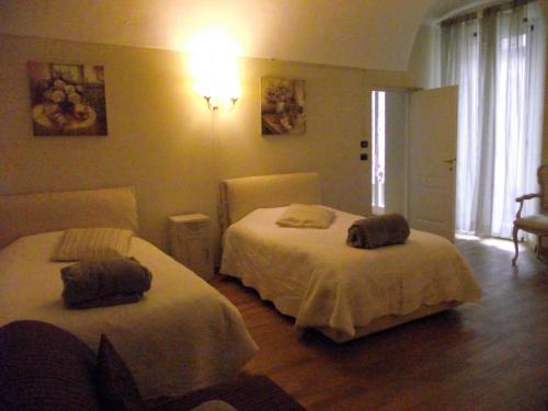Un pat sau paturi într-o cameră la Casa Delfino