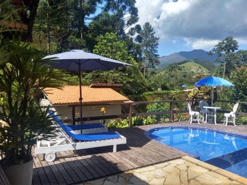 Πισίνα στο ή κοντά στο Chalés vale da mata