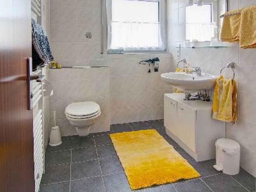 Ванная комната в Ferienwohnungen Tröndle im Rosendorf