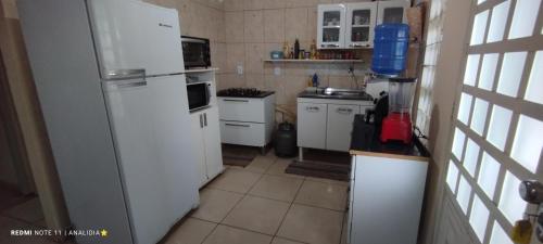 Kuchyň nebo kuchyňský kout v ubytování Casa das Anas