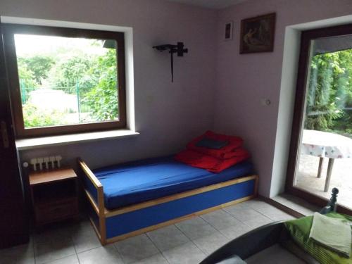 a small bed in a room with a window at 10 os - Gdansk-Sopot-Gdynia up to 19 persons in Gdynia