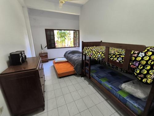 Katil atau katil-katil dalam bilik di Gran casa quinta y apartamentos ideal para grupos