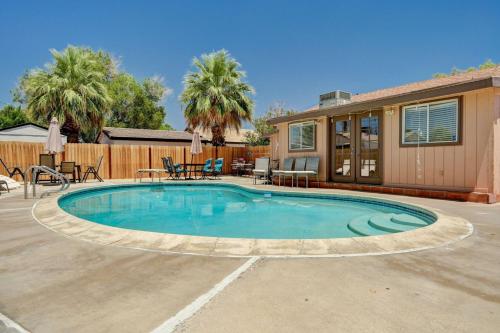 a swimming pool in the middle of a yard at 3 Bedrooms house in Marvelous Las Vegas in Las Vegas