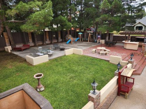 an aerial view of a yard with a playground at Alpine Country Club Lofts in Alpine