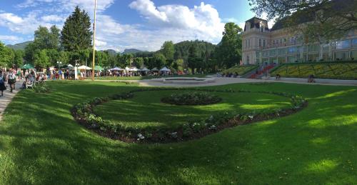 a circle in the grass in front of a building at Villa Stadlmann in Bad Ischl
