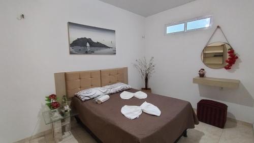 En eller flere senge i et værelse på Casa ah temporal