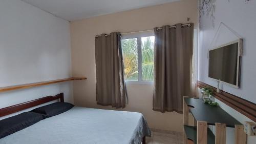 En eller flere senge i et værelse på Casa ah temporal