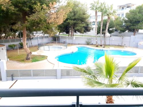 Swimmingpoolen hos eller tæt på Apartamento Brisas Luminosas