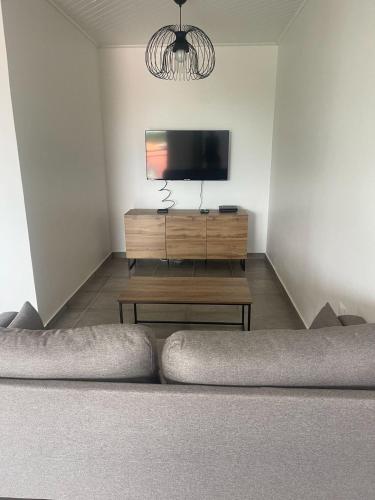 Marin Bay - Ensemble 4 appartements jusqu'à 12 personnesにあるテレビまたはエンターテインメントセンター
