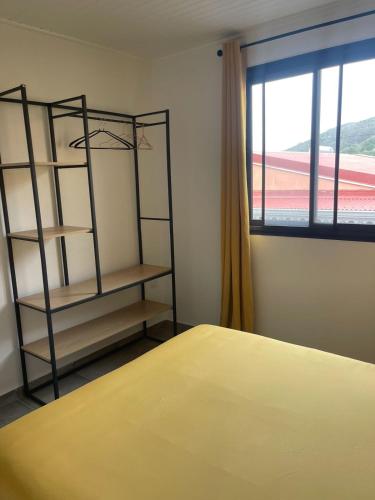 Marin Bay - Ensemble 4 appartements jusqu'à 12 personnesにあるベッド