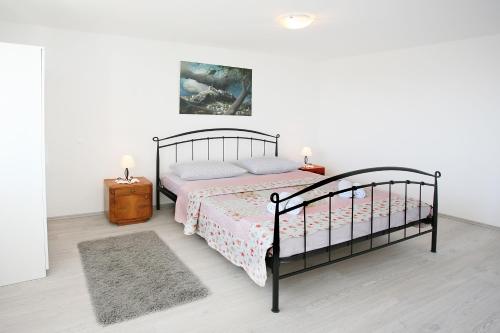 Postel nebo postele na pokoji v ubytování Holiday Home Miklica