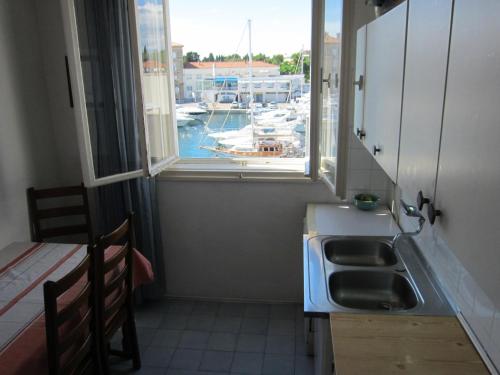 Kuchyňa alebo kuchynka v ubytovaní Apartment ML