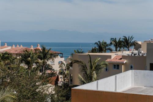 a view of the ocean from a building at Apartment Ola Mita in Punta Mita