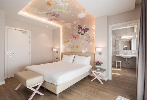 Katil atau katil-katil dalam bilik di Hotel Resort & Spa Miramonti