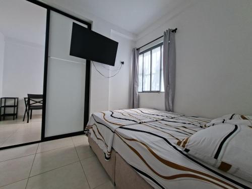 Cama ou camas em um quarto em San Luis Apartamento 301 Cúcuta