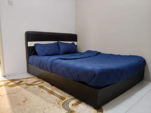 Katil atau katil-katil dalam bilik di Adila Alfina Heaven Homestay Cameron Highlands
