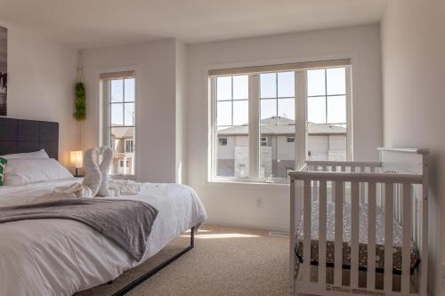 Postel nebo postele na pokoji v ubytování 4bed25 Bathbrand Newniagara Fallssleeps15