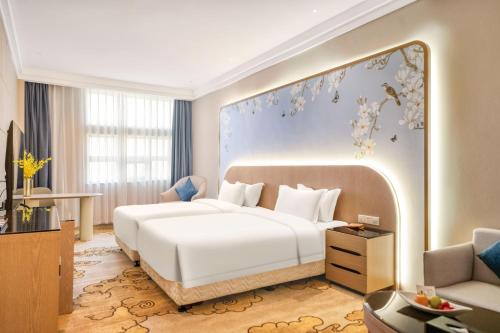 Cama o camas de una habitación en Dayhello Hotel Shenzhen Shekou