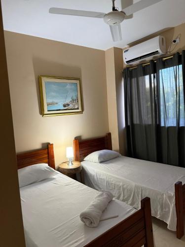 Postel nebo postele na pokoji v ubytování Apartamento moderno con todo lo que necesitas