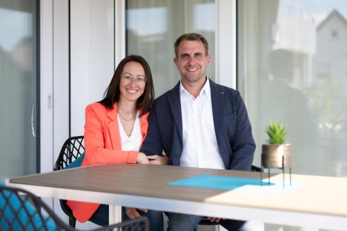 a man and a woman sitting at a table at Das Adler in Markdorf