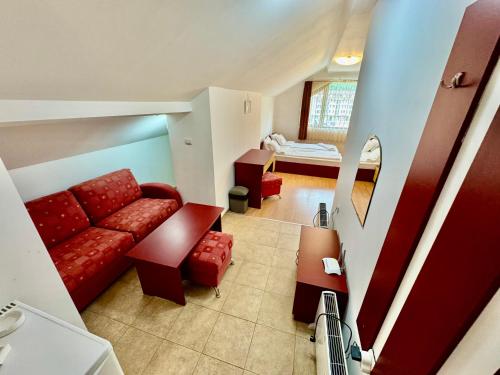Postel nebo postele na pokoji v ubytování Todorini Kuli Apartments