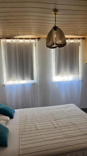 Postel nebo postele na pokoji v ubytování The Olive Tree