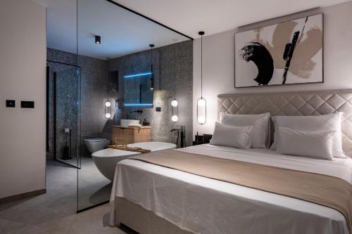 Postel nebo postele na pokoji v ubytování Cortile House