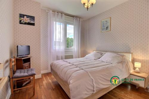 Llit o llits en una habitació de Ty lann
