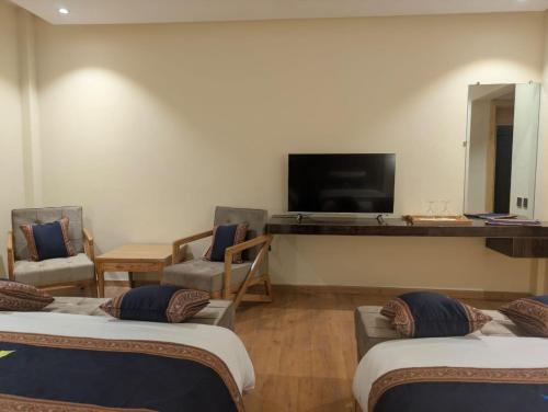 TV/Unterhaltungsangebot in der Unterkunft Apex Hotels and Resorts Skardu