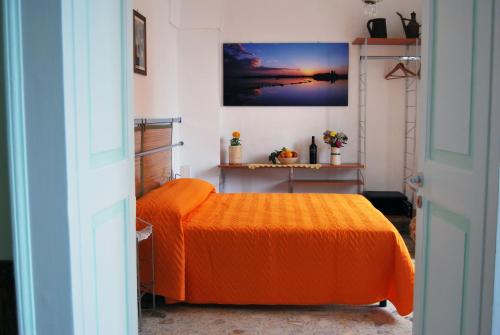 Una cama o camas en una habitación de DF bed and breakfast