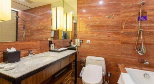 Un baño de Excemon Yuyao Hemudu Hotel