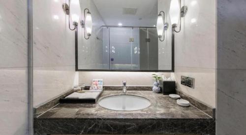 Un baño de Excemon Yuyao Hemudu Hotel