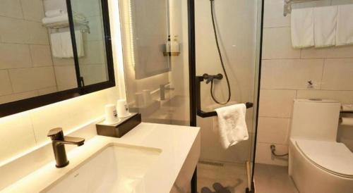 Ένα μπάνιο στο GreenTree Inn Maanshan Hanshan District Jiuwu Square Hotel