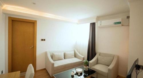 Χώρος καθιστικού στο GreenTree Inn Qingyuan Qinghe Avenue Branch