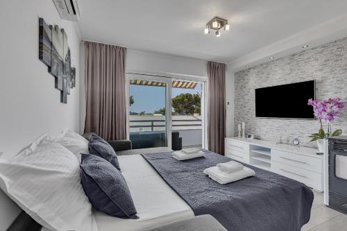 Posteľ alebo postele v izbe v ubytovaní Apartment San Marino