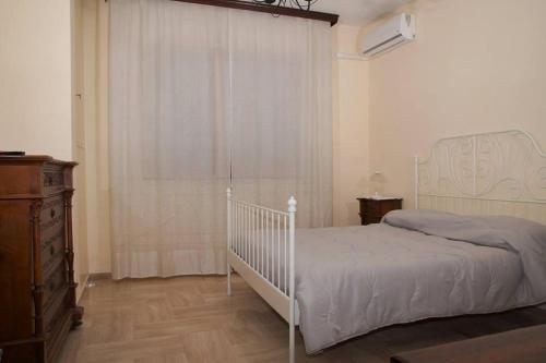 Posteľ alebo postele v izbe v ubytovaní B&B La Bougainvillea