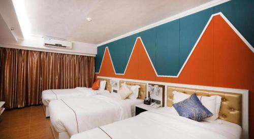 Кровать или кровати в номере Towns Well Motel