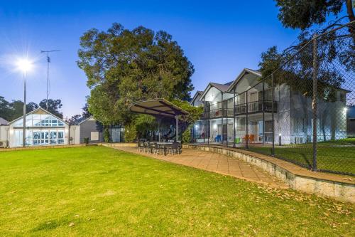 a park in front of a building at Mandurah Quay Resort in Mandurah
