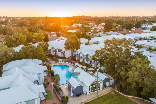an aerial view of a resort with a swimming pool at Mandurah Quay Resort in Mandurah
