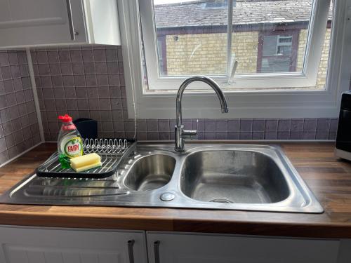Η κουζίνα ή μικρή κουζίνα στο Cosy Central Cambridge Apartment's