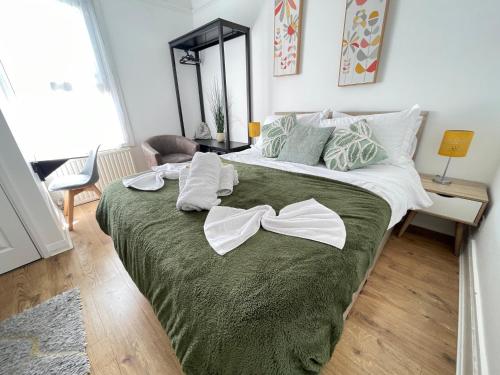 Ένα ή περισσότερα κρεβάτια σε δωμάτιο στο Cosy Central Cambridge Apartment's