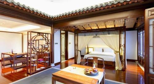Cama o camas de una habitación en Langfang Ovation Hotel