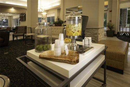 a table with a blender and green apples on it at Hilton Garden Inn Fayetteville/Fort Bragg in Fayetteville