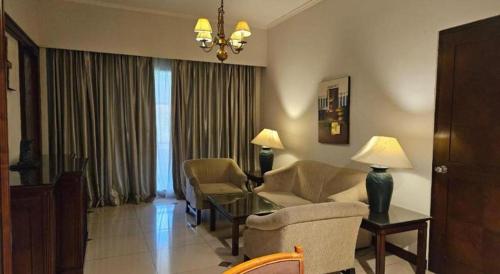 Гостиная зона в Bumi Wiyata Hotel