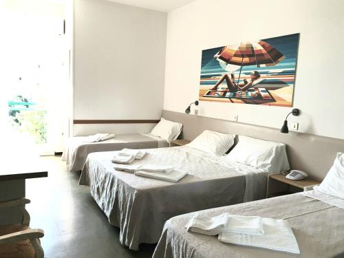 Postel nebo postele na pokoji v ubytování Hotel Internazionale