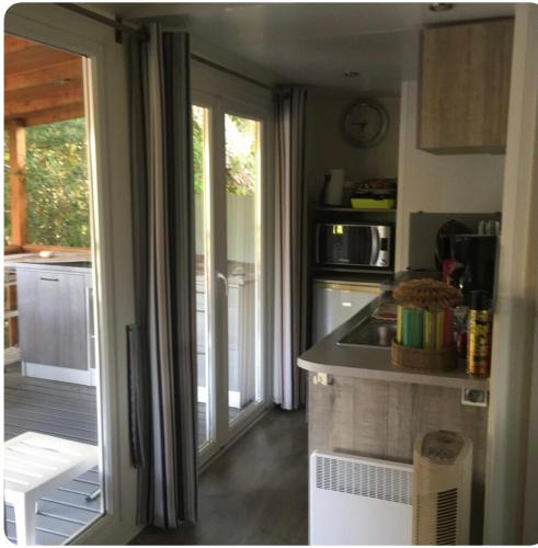 Kuchyň nebo kuchyňský kout v ubytování Chalet cosy