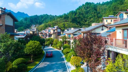a street in a small town with houses at Avatar Valley Villas in Zhangjiajie