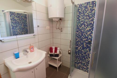 Koupelna v ubytování Apartments Lucefinka